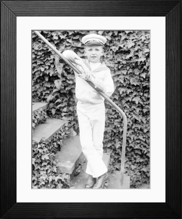 Framed Print : Little boy in a sailor suit in a garden, Mid Wales Framed Print : Little boy in a sailor suit in a garden, Mid Wales
