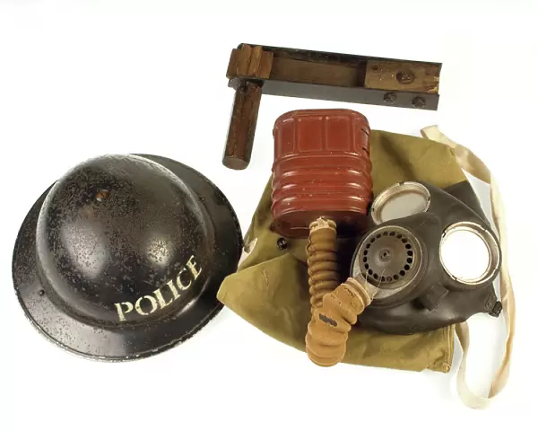 Metropolitan Police gas mask, bag, rattle and tin helmet