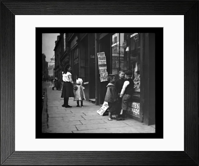 Framed Print : Edwardian children outside a shop Framed Print : Edwardian children outside a shop