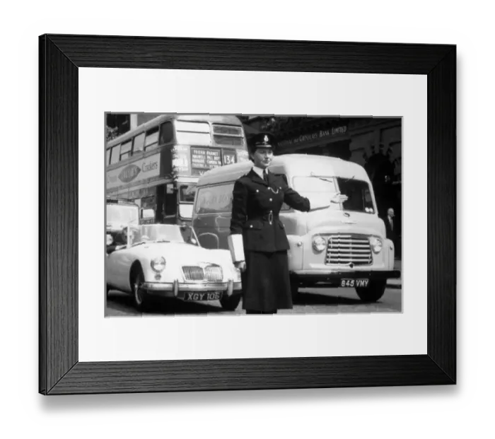 Framed Print : Policewoman on traffic duty Framed Print : Policewoman on traffic duty