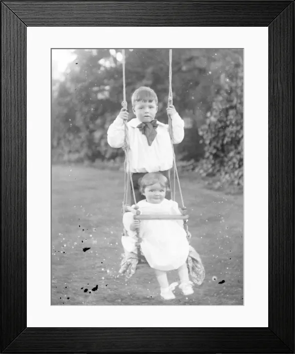 Framed Print : Two Edwardian children on a swing, Mid Wales Framed Print : Two Edwardian children on a swing, Mid Wales