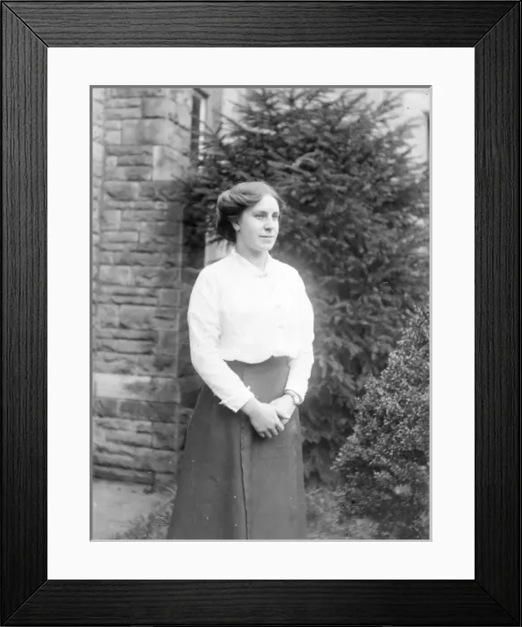 Framed Print : Young Edwardian woman standing in a garden, Mid Wales Framed Print : Young Edwardian woman standing in a garden, Mid Wales