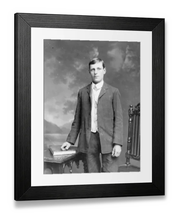 Framed Print : Young man with book and table, Mid Wales Framed Print : Young man with book and table, Mid Wales