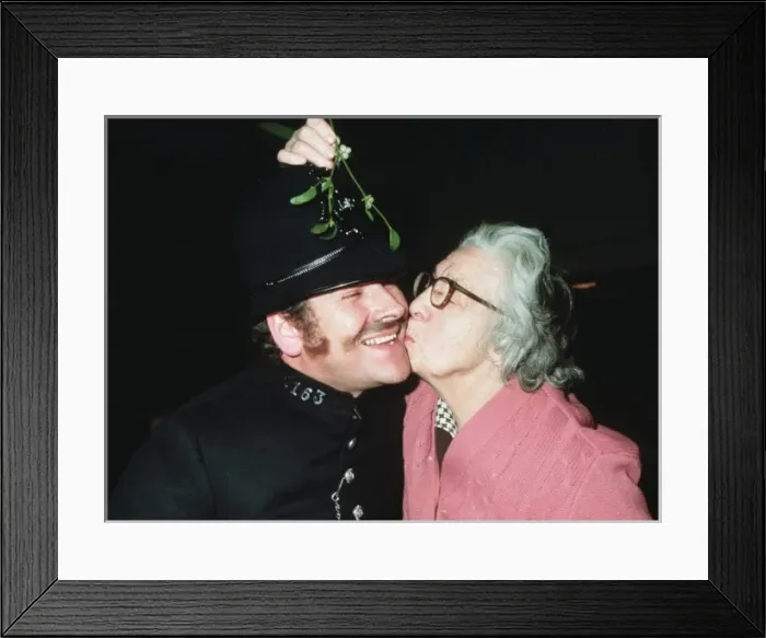 Framed Print : Policeman with enthusiastic granny Framed Print : Policeman with enthusiastic granny