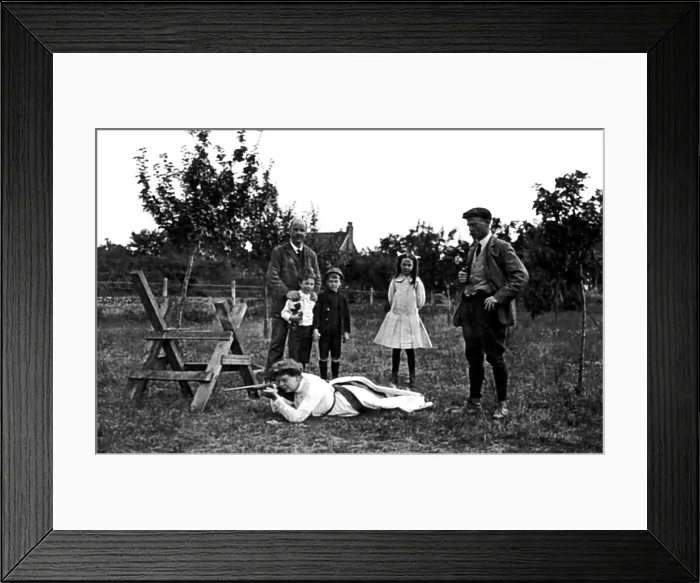 Framed Print : Malby family at leisure in their garden
