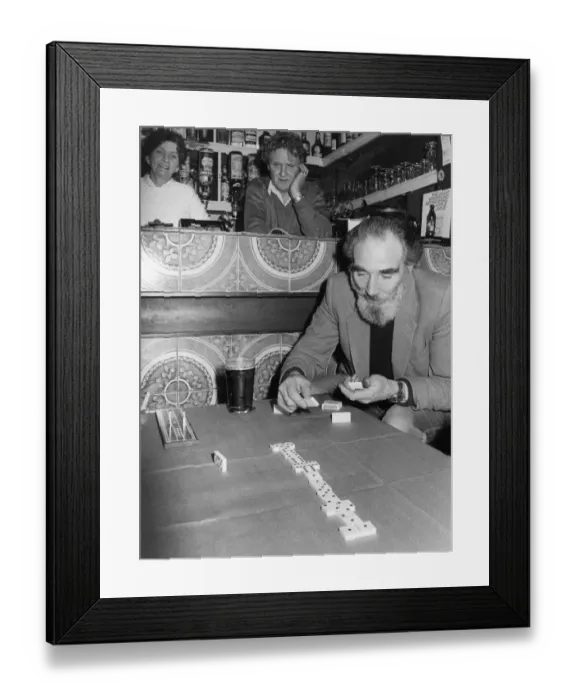 Framed Print : Domino Player - Penzance, Cornwall Framed Print : Domino Player - Penzance, Cornwall