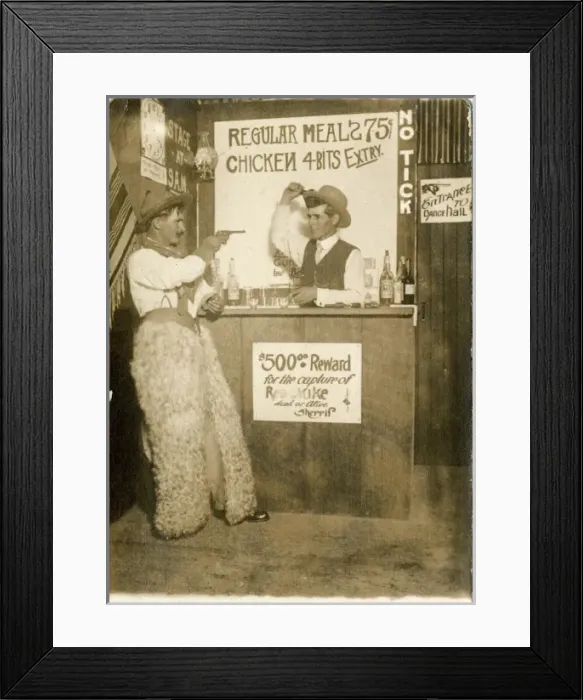 Framed Print : Cowboy holding up a bartender in a bar Framed Print : Cowboy holding up a bartender in a bar