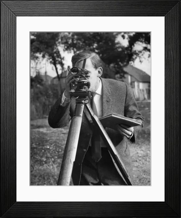 Framed Print : Surveyor at work with a theodolite Framed Print : Surveyor at work with a theodolite