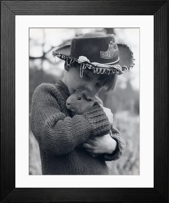 Framed Print : Gipsy boy with his pet guinea pig Framed Print : Gipsy boy with his pet guinea pig