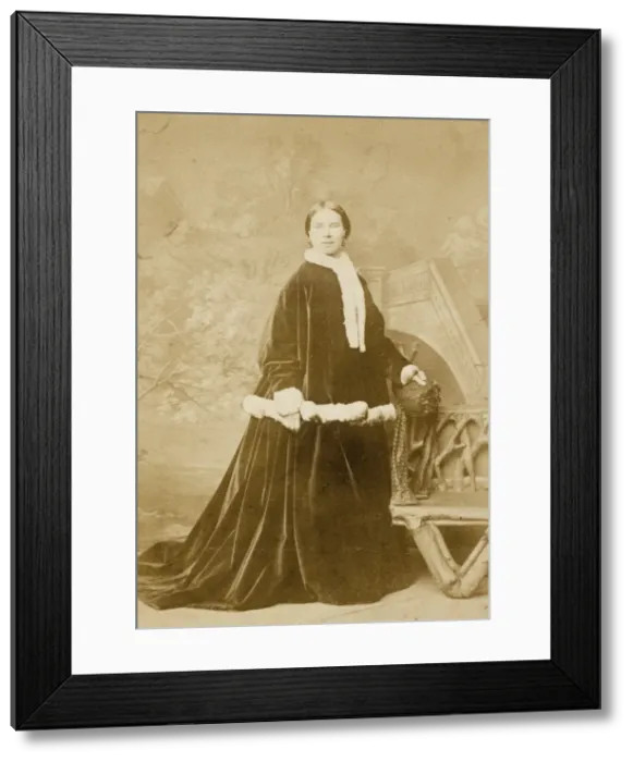 Framed Print : Victorian woman in dark velvet trimmed with white fur Framed Print : Victorian woman in dark velvet trimmed with white fur