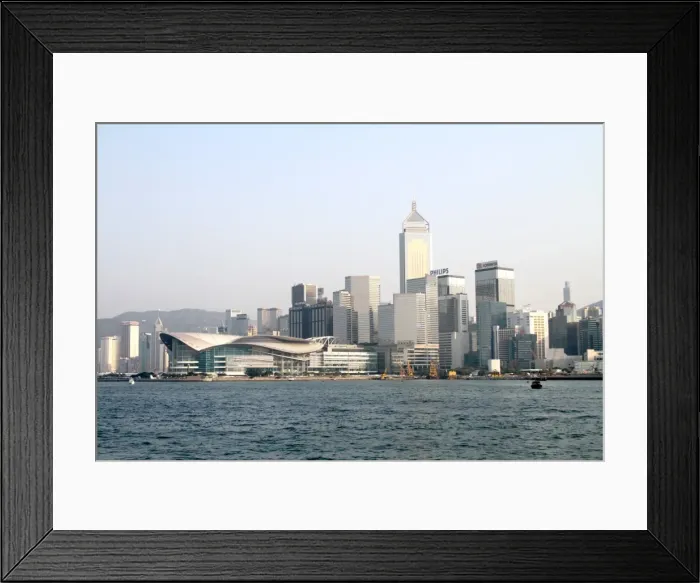 Framed Print : Hong Kong skyline with the Exhibition and Convention Centre in Hong Kong, China Framed Print : Hong Kong skyline with the Exhibition and Convention Centre in Hong Kong, China