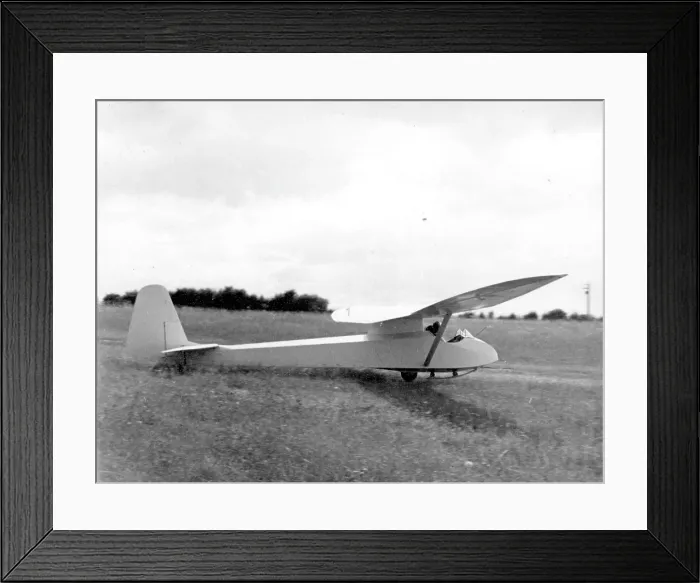 Framed Print : Slingsby T.21 training glider rolling on launch Framed Print : Slingsby T.21 training glider rolling on launch