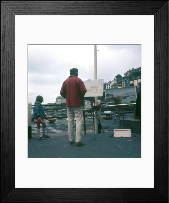 Framed Print : Outdoor painter working on Brixham Harbour, Devon Framed Print : Outdoor painter working on Brixham Harbour, Devon
