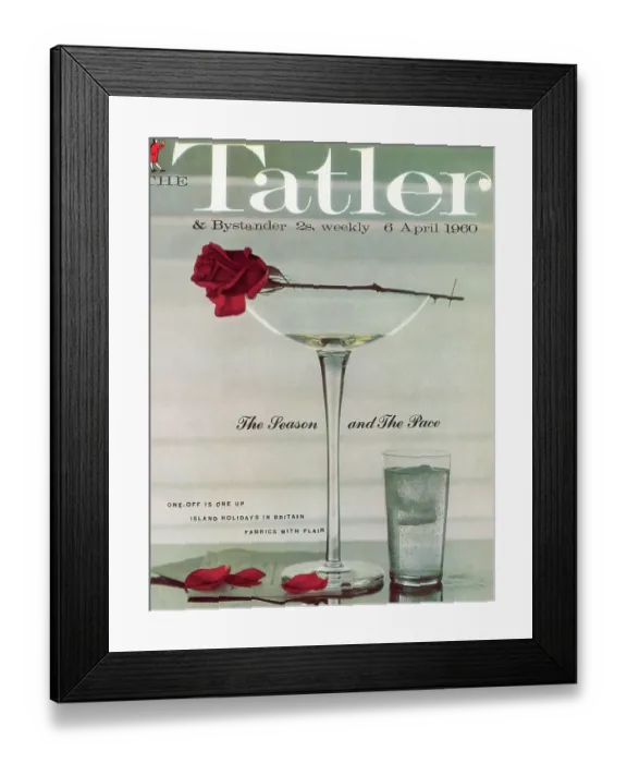 Framed Print : Tatler Front Cover - A wilting red rose is balanced on top of a nearly empty champagne glass, having shed a few petals onto the table Framed Print : Tatler Front Cover - A wilting red rose is balanced on top of a nearly empty champagne glass, having shed a few petals onto the table