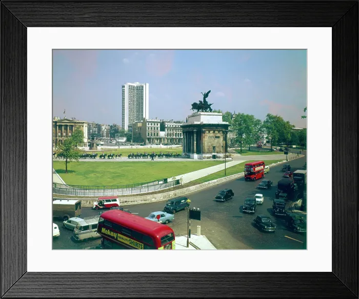Framed Print : Hyde Park Corner with Wellington Arch and the Hilton Hotel, London. Date: circa 1960s Framed Print : Hyde Park Corner with Wellington Arch and the Hilton Hotel, London. Date: circa 1960s