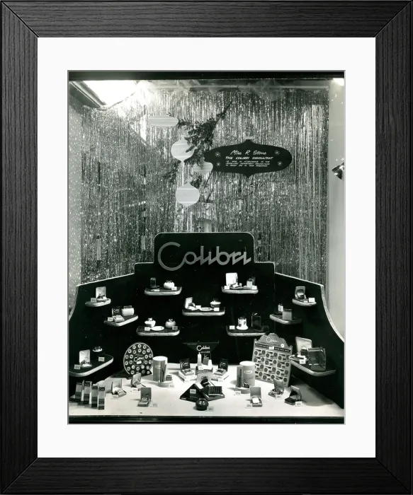 Framed Print : Colibri cigarette lighter and cigarette case window display Framed Print : Colibri cigarette lighter and cigarette case window display