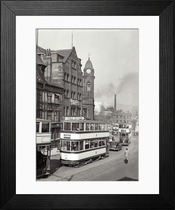 Framed Print : Trams and clocktower in Sheffield Haymarket. Can see Davy's food store Date: 1947 - 1948