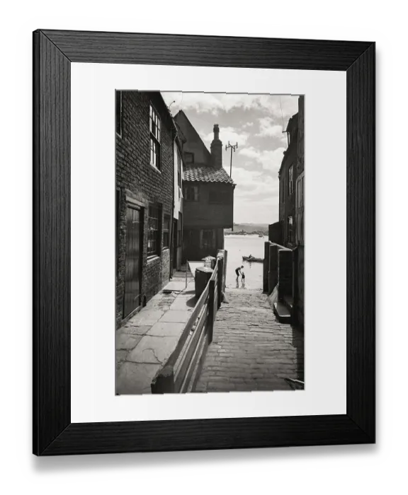 Framed Print : Adult and child silhouette in water in Yorkshire coastal fishing village Date: 1947 - 1948 Framed Print : Adult and child silhouette in water in Yorkshire coastal fishing village Date: 1947 - 1948