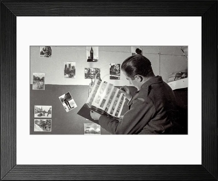 Framed Print : John closely examining negatives in the darkroom where he was able to hone his skills as part of his time at the Polish Resettlement Camp in Helmsley, Yorkshire Framed Print : John closely examining negatives in the darkroom where he was able to hone his skills as part of his time at the Polish Resettlement Camp in Helmsley, Yorkshire