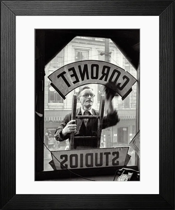 Framed Print : Shot from inside Portrait studio of man cleaning studio window sign, Haymarket, Sheffield Date: 1948 - 1950 Framed Print : Shot from inside Portrait studio of man cleaning studio window sign, Haymarket, Sheffield Date: 1948 - 1950