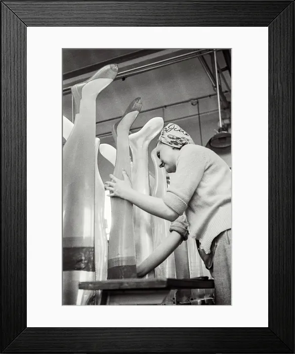 Framed Print : Aristoc staff handling stockings Framed Print : Aristoc staff handling stockings