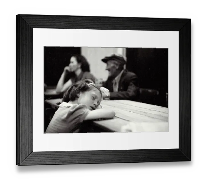 Framed Print : Young girl sleeping on table Framed Print : Young girl sleeping on table