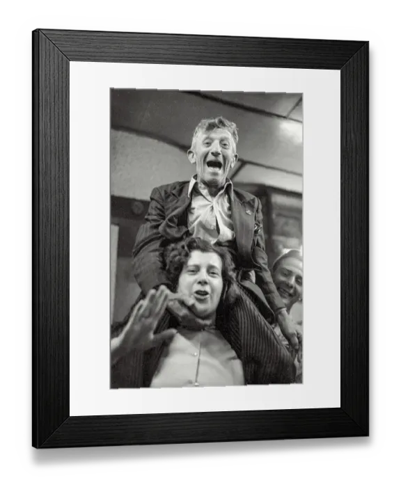 Framed Print : Older slight man sitting on shoulders of younger woman during dancing to small band playing in daylight at local bar at Cafe In de Ton de Koninck in Katten Straat Antwerp-both Framed Print : Older slight man sitting on shoulders of younger woman during dancing to small band playing in daylight at local bar at Cafe In de Ton de Koninck in Katten Straat Antwerp-both