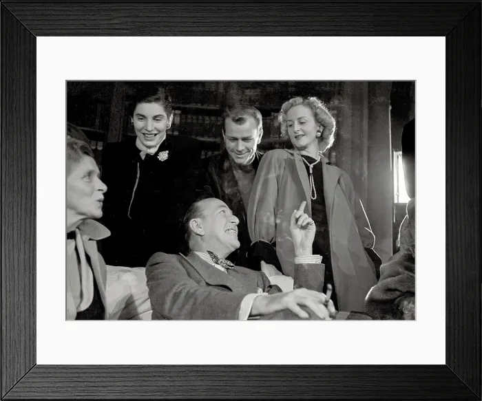 Framed Print : Noel Coward sits relaxed surrounded by 4 smiling standing cast members during rehearsals of play Relative Values which opened Savoy Theatre in November 1951 Framed Print : Noel Coward sits relaxed surrounded by 4 smiling standing cast members during rehearsals of play Relative Values which opened Savoy Theatre in November 1951