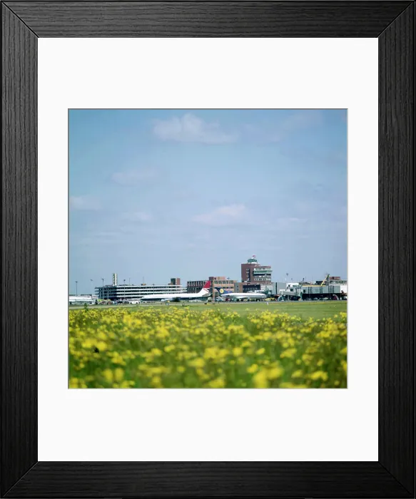 Framed Print : London Heathrow Airport - View out over the runways toward the terminal buildings and control tower. Date: circa 1960s Framed Print : London Heathrow Airport - View out over the runways toward the terminal buildings and control tower. Date: circa 1960s