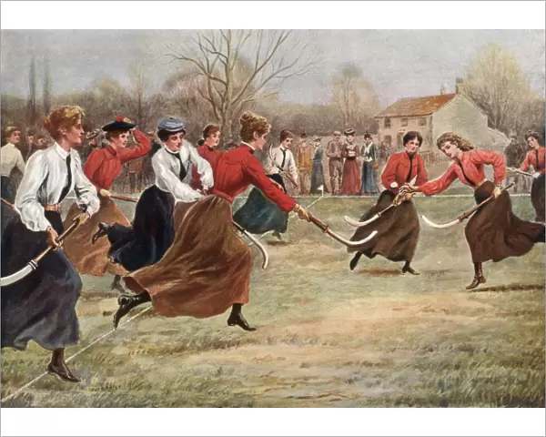 Women playing hockey