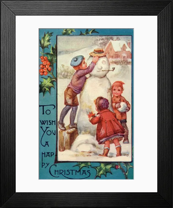 Framed Print : Three children completing their snowman Framed Print : Three children completing their snowman