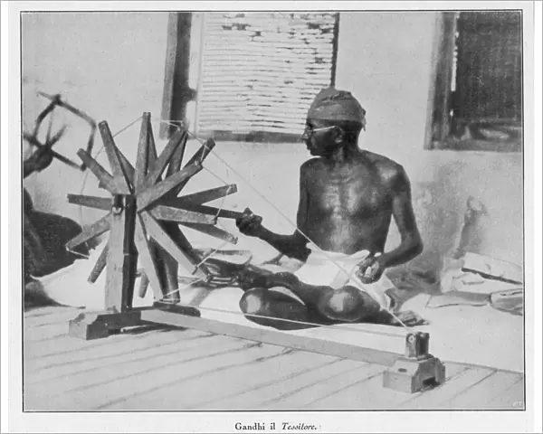 Mahatma Gandhi spinning at his wheel