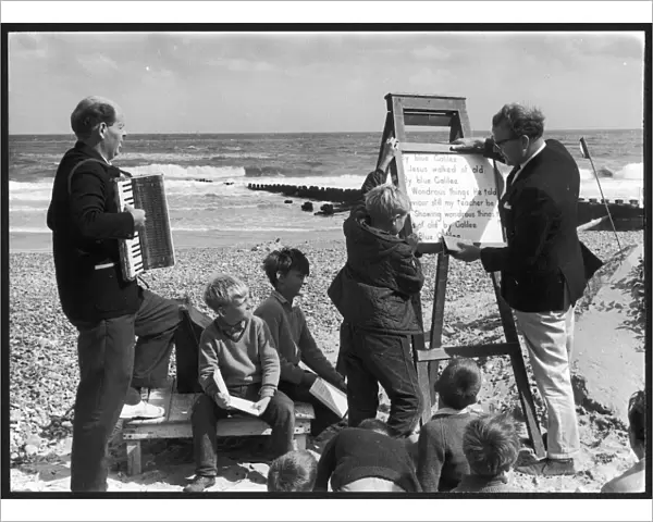 Religious service being held on a beach