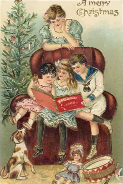 Enjoying Presents. Children with their presents share the delights of a picture book