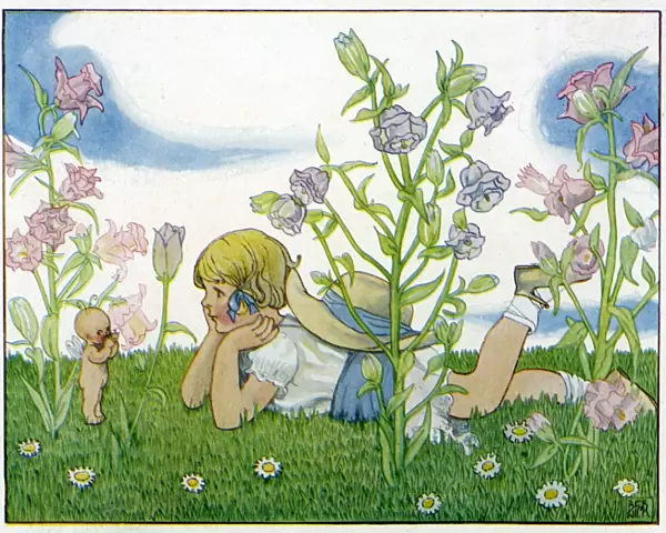 Girl with a baby fairy lying in the garden in summer