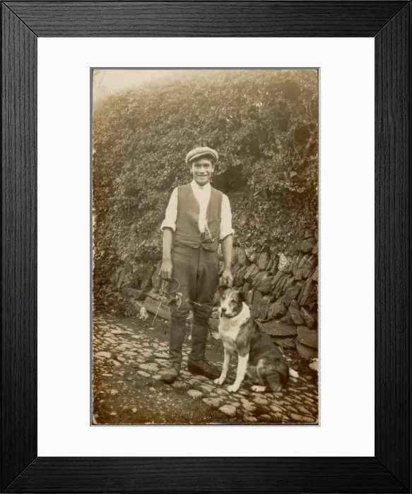 Framed Print : Young Man and Dog Framed Print : Young Man and Dog