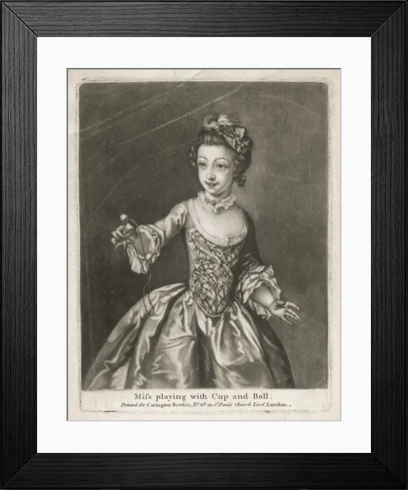 Framed Print : Girl Plays Cup and Ball Framed Print : Girl Plays Cup and Ball