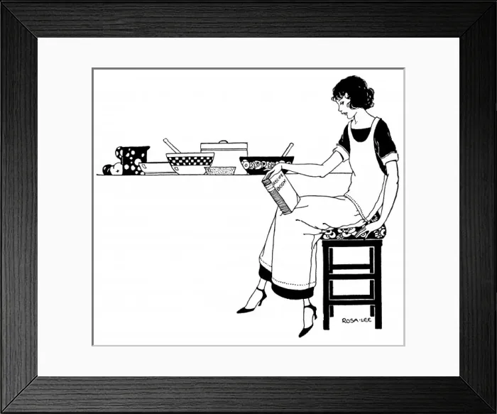 Framed Print : Reading a Cook Book Framed Print : Reading a Cook Book