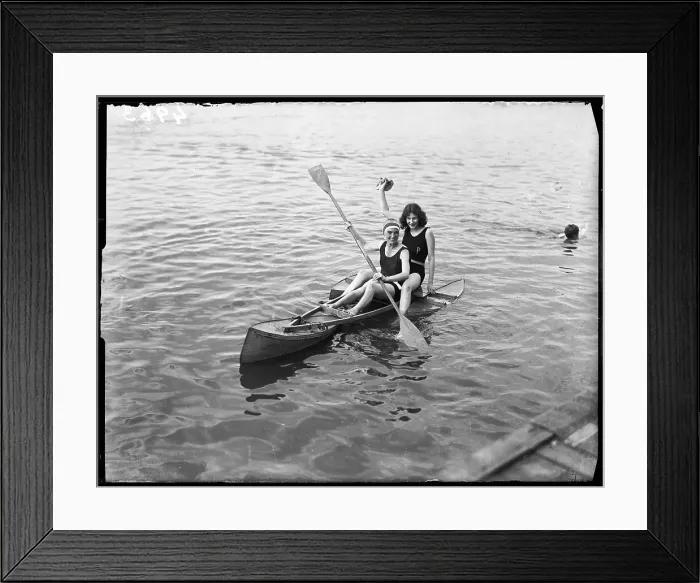 Framed Print : Two Girls in a Canoe Framed Print : Two Girls in a Canoe
