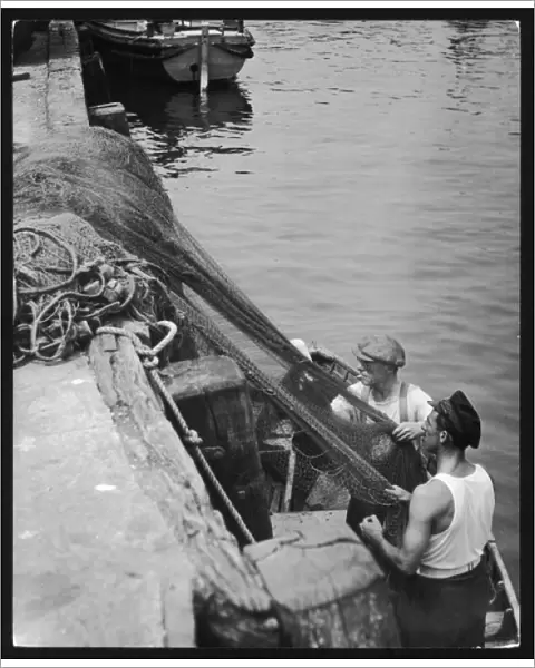 Fishermen Mending Nets