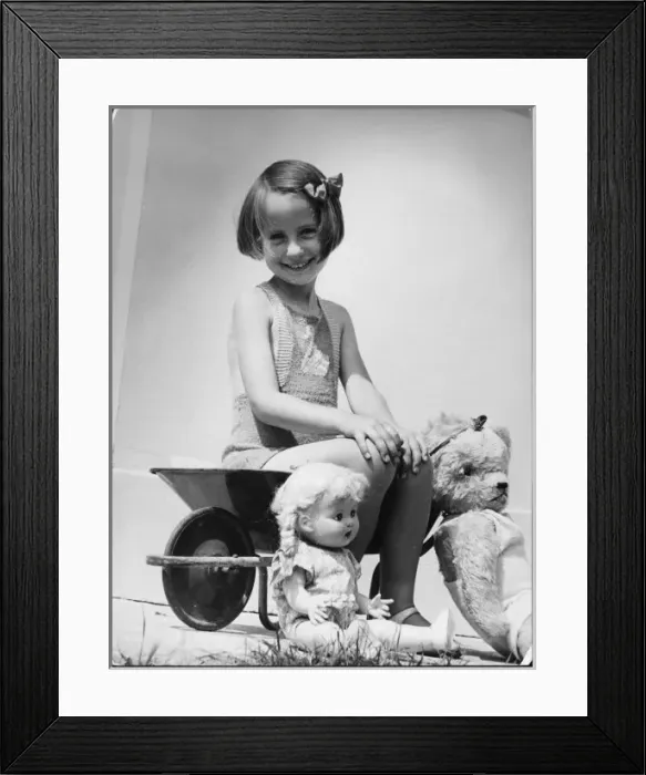 Framed Print : Girl with Toys 1940S Framed Print : Girl with Toys 1940S