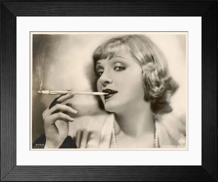 Framed Print : Smoking through Holder Framed Print : Smoking through Holder