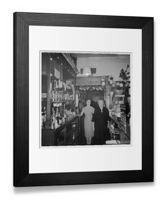 Framed Print : Two Women Behind Bar Framed Print : Two Women Behind Bar