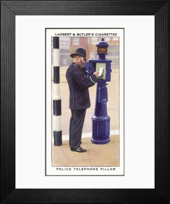 Framed Print : Policeman Uses Telephone Framed Print : Policeman Uses Telephone