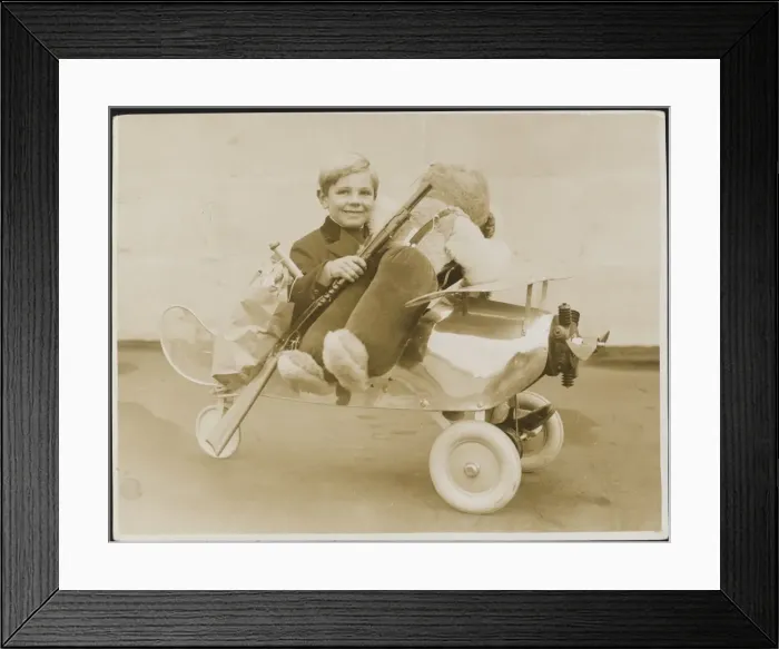 Framed Print : Child in Model Aeroplane Framed Print : Child in Model Aeroplane