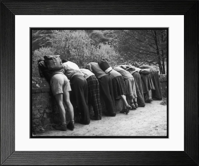Framed Print : Group Looking over Wall Framed Print : Group Looking over Wall