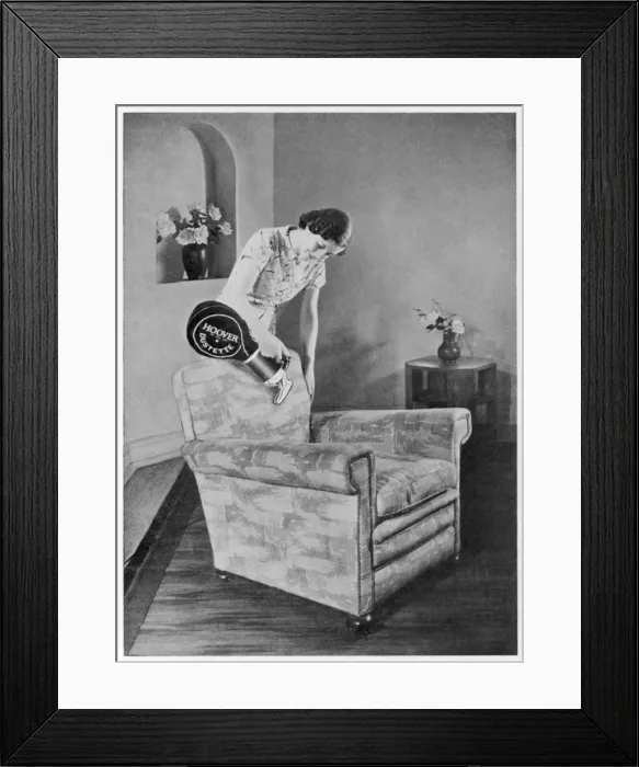Framed Print : Hoovering a Chair 1930S Framed Print : Hoovering a Chair 1930S