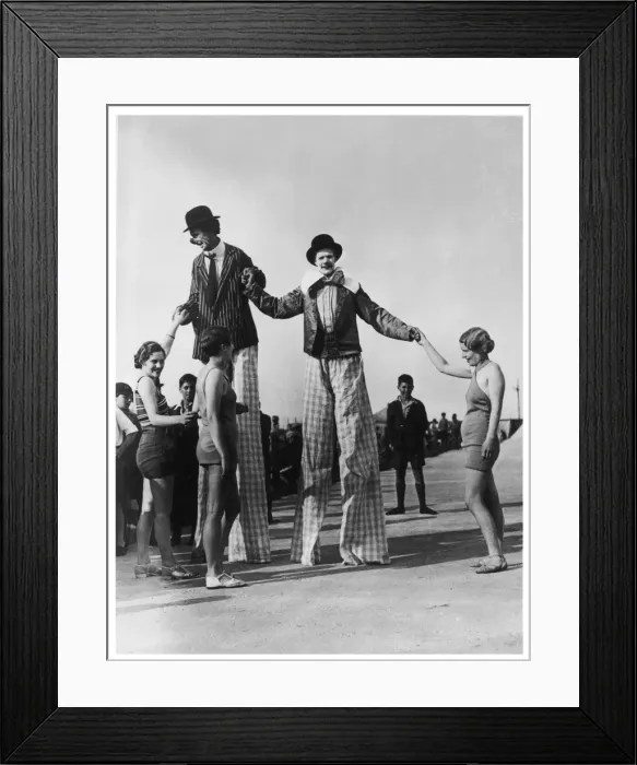 Framed Print : Clowns on Stilts 1933 Framed Print : Clowns on Stilts 1933