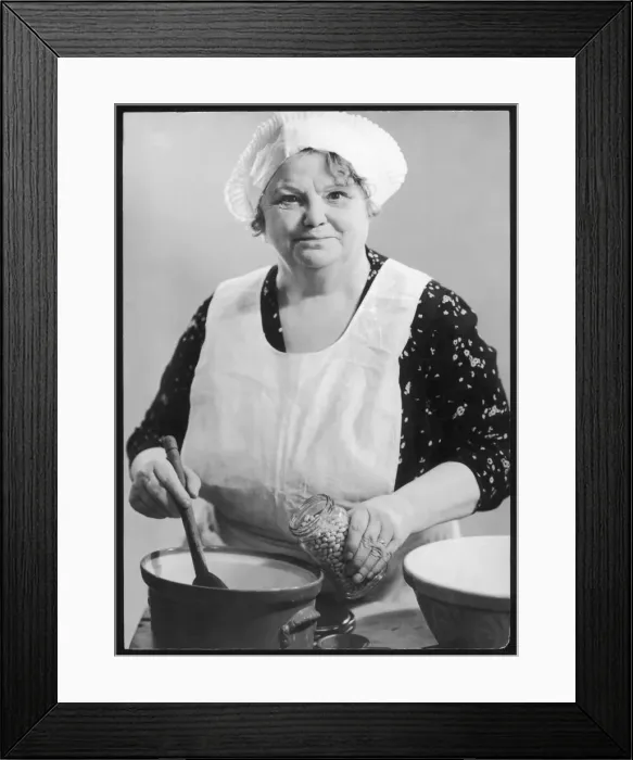 Framed Print : Portly Woman Adds Beans Framed Print : Portly Woman Adds Beans