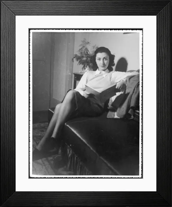 Framed Print : Woman Reads on Sofa Framed Print : Woman Reads on Sofa